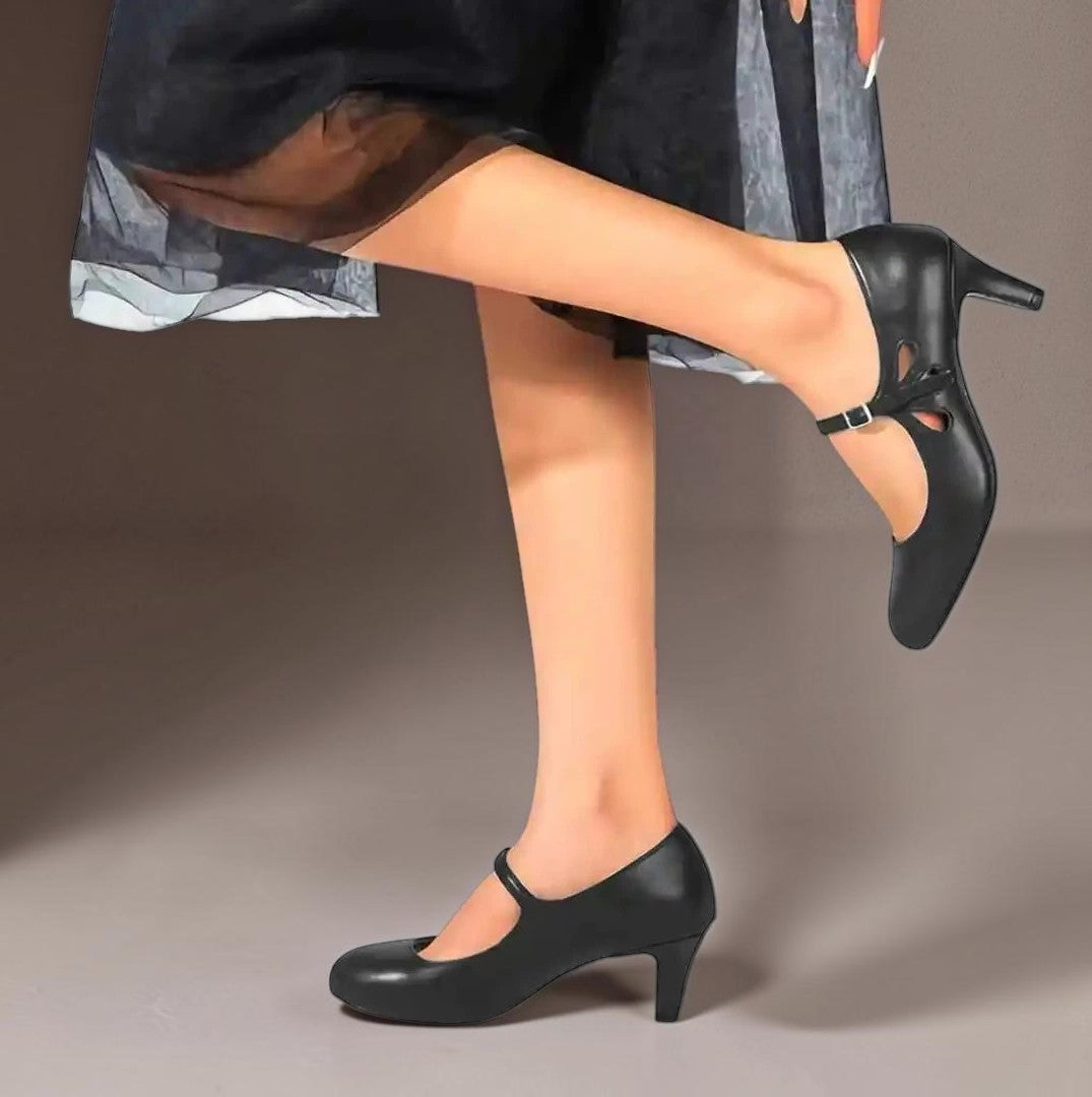 Classic black closed-toe office pumps on a manageable heel