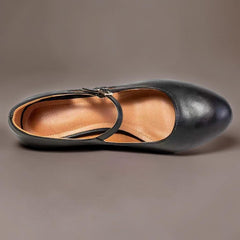 Classic black closed-toe office pumps on a manageable heel