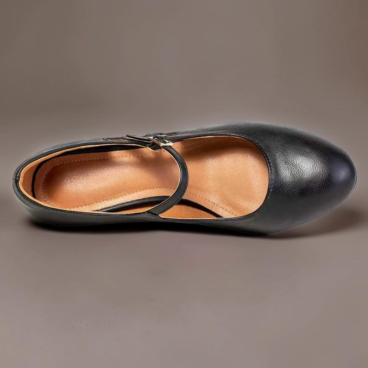Classic black closed-toe office pumps on a manageable heel