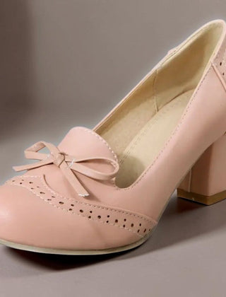Adelaide closed-toe bow slip-on pumps on a low heel, shown in beige, pink and blue