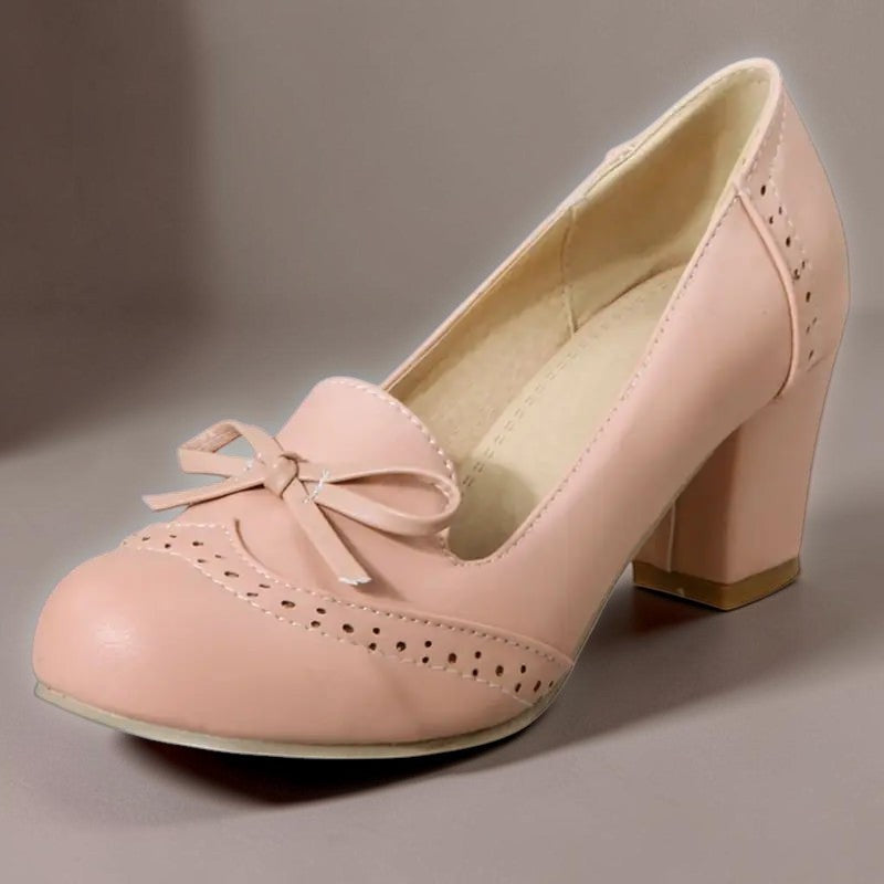 Adelaide closed-toe bow slip-on pumps on a low heel, shown in beige, pink and blue