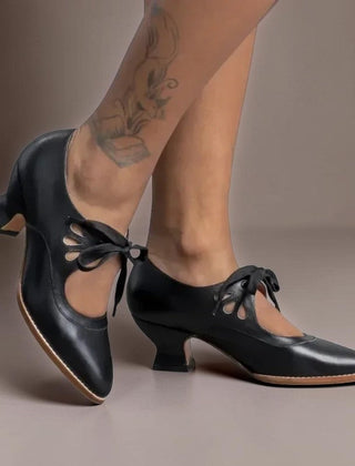Vintage lace-up Mary Jane pumps with adjustable instep strap and rounded toe