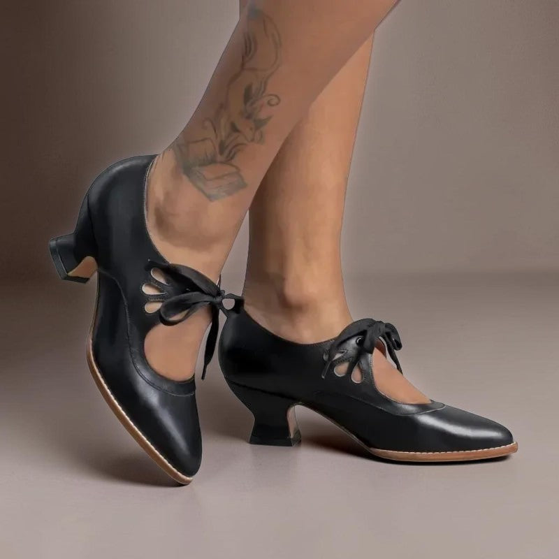 Vintage lace-up Mary Jane pumps with adjustable instep strap and rounded toe