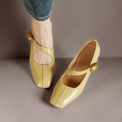 Genuine leather Mary Jane heels with a tilted buckle strap, square toe and concealed wedge sole