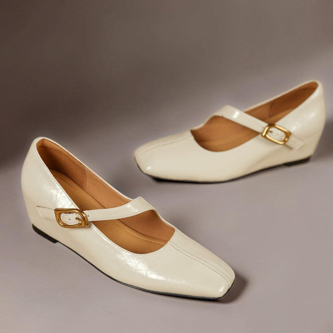 Genuine leather Mary Jane heels with a tilted buckle strap, square toe and concealed wedge sole