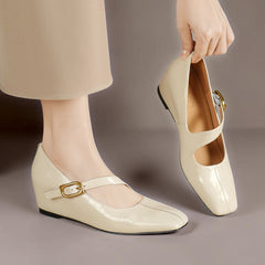 Genuine leather Mary Jane heels with a tilted buckle strap, square toe and concealed wedge sole