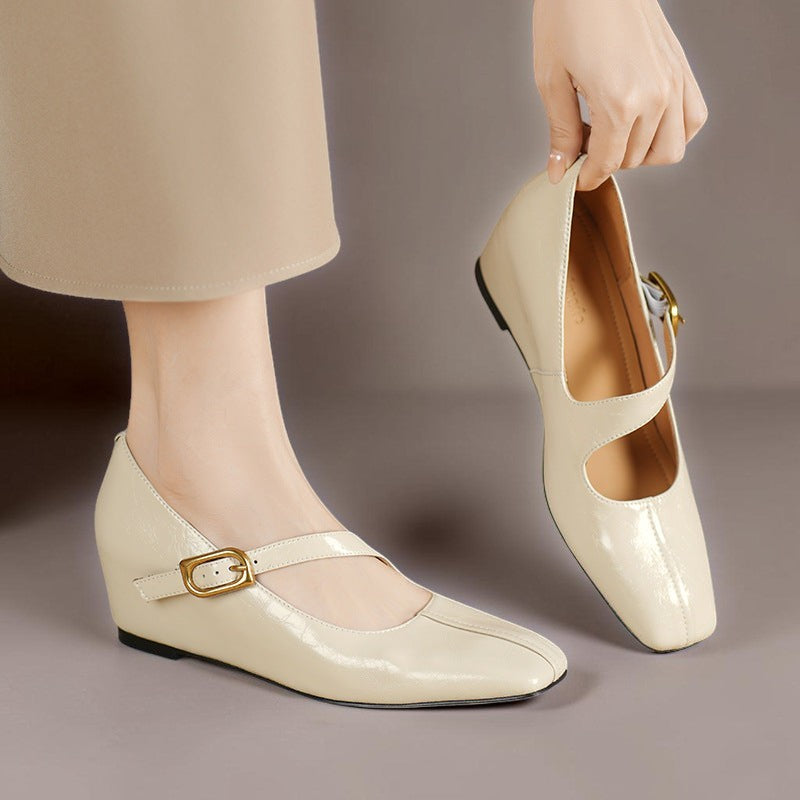 Genuine leather Mary Jane heels with a tilted buckle strap, square toe and concealed wedge sole