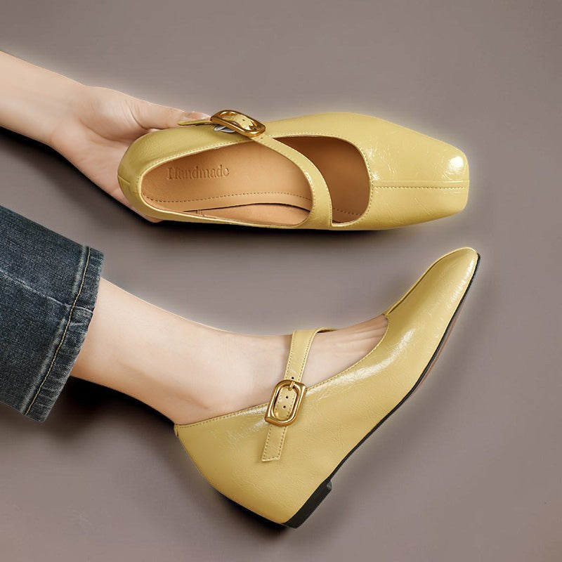 Genuine leather Mary Jane heels with a tilted buckle strap, square toe and concealed wedge sole