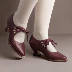 Vintage lace-up Mary Jane pumps with adjustable instep strap and rounded toe