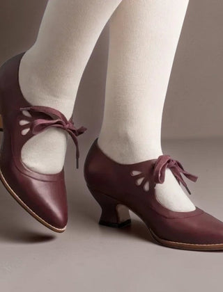 Vintage lace-up Mary Jane pumps with adjustable instep strap and rounded toe