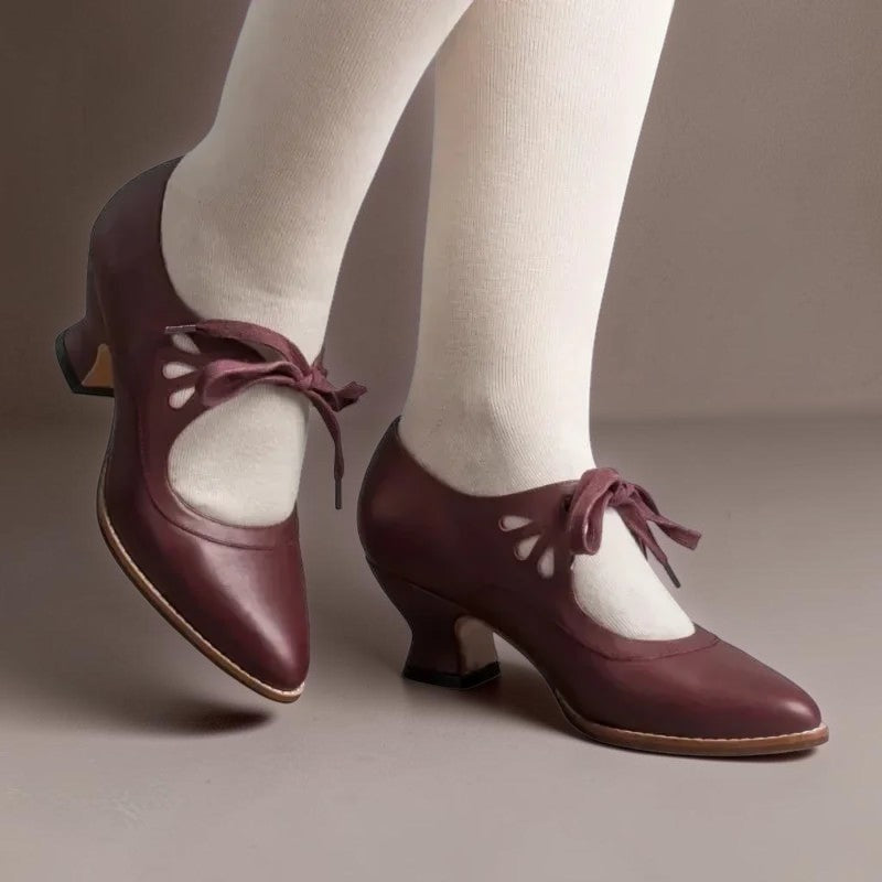 Vintage lace-up Mary Jane pumps with adjustable instep strap and rounded toe
